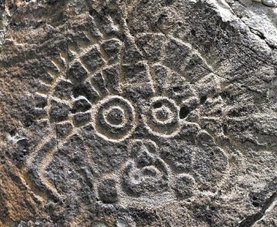 画在岩石上的狰狞面孔 表达了人类祖先怎样的<em>思想感情</em>？