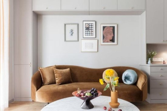 103平<em>现代</em>简约风三居室，焦糖色的沙发现在成为客厅的焦点