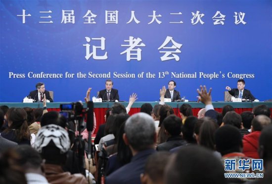 国务委员兼外交部长王毅就中国外交政策和对外关系回答中外记者...