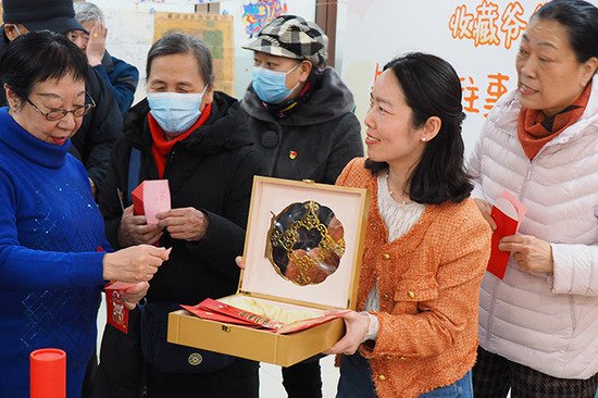 跟着旧书学民俗 西城展览路居民重温“老北京地图”里的身边故事
